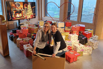 Amgen im Einsatz gegen Kinderarmut in der Schweiz: Geschenke als Hoffnungsschimmer